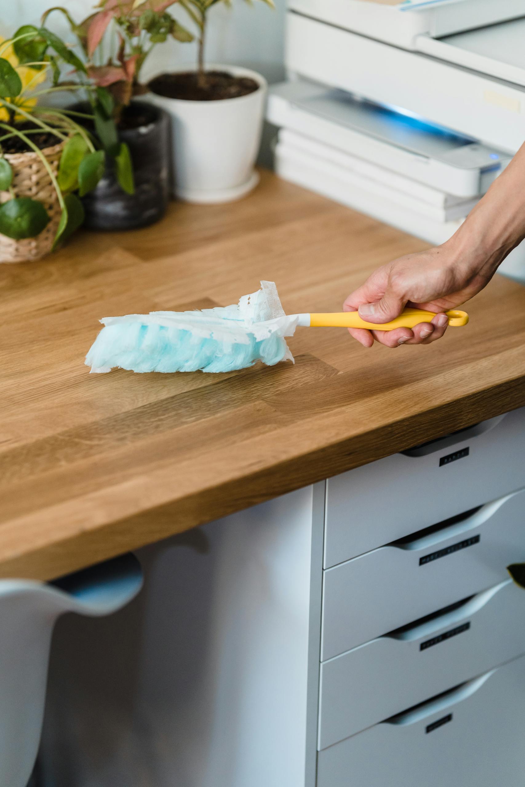 Commercial Cleaning and Office Cleaning 5 Person Holding Yellow Handle Swiffer